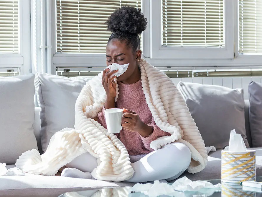 Woman who is dealing with the common cold