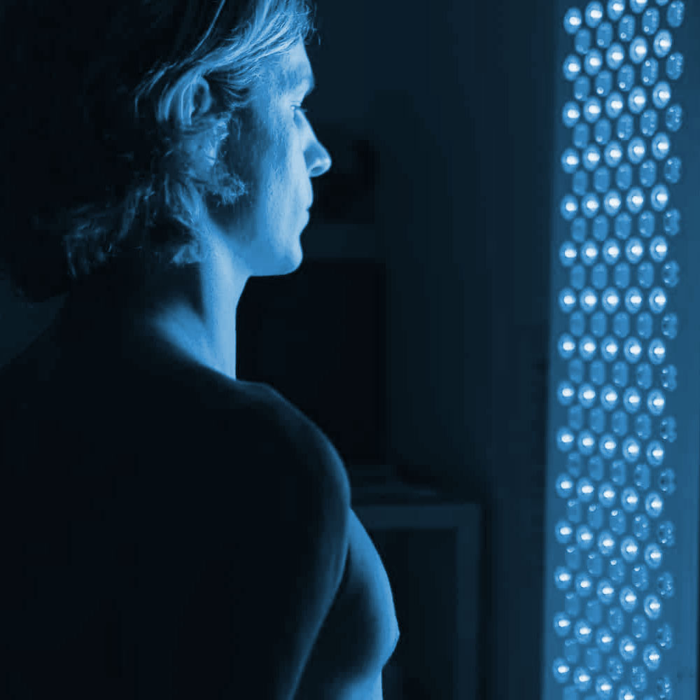Strong blue light therapy with person