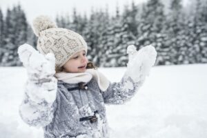 happy girl in winter landscape