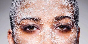 Women face trying salt therapy on her face