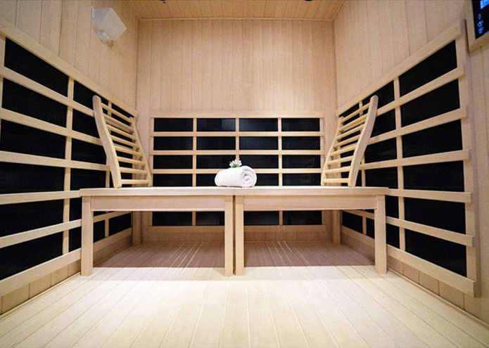 Sauna room front view with towel in the middle